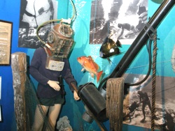 Today, the museum contains artifacts and ephemera covering 4,000 years of diving history. Highlights include an exhibit of dive helmets from around the world, and one dedicated to Upper Keys treasure hunter Art "Silver Bar" McKee.
